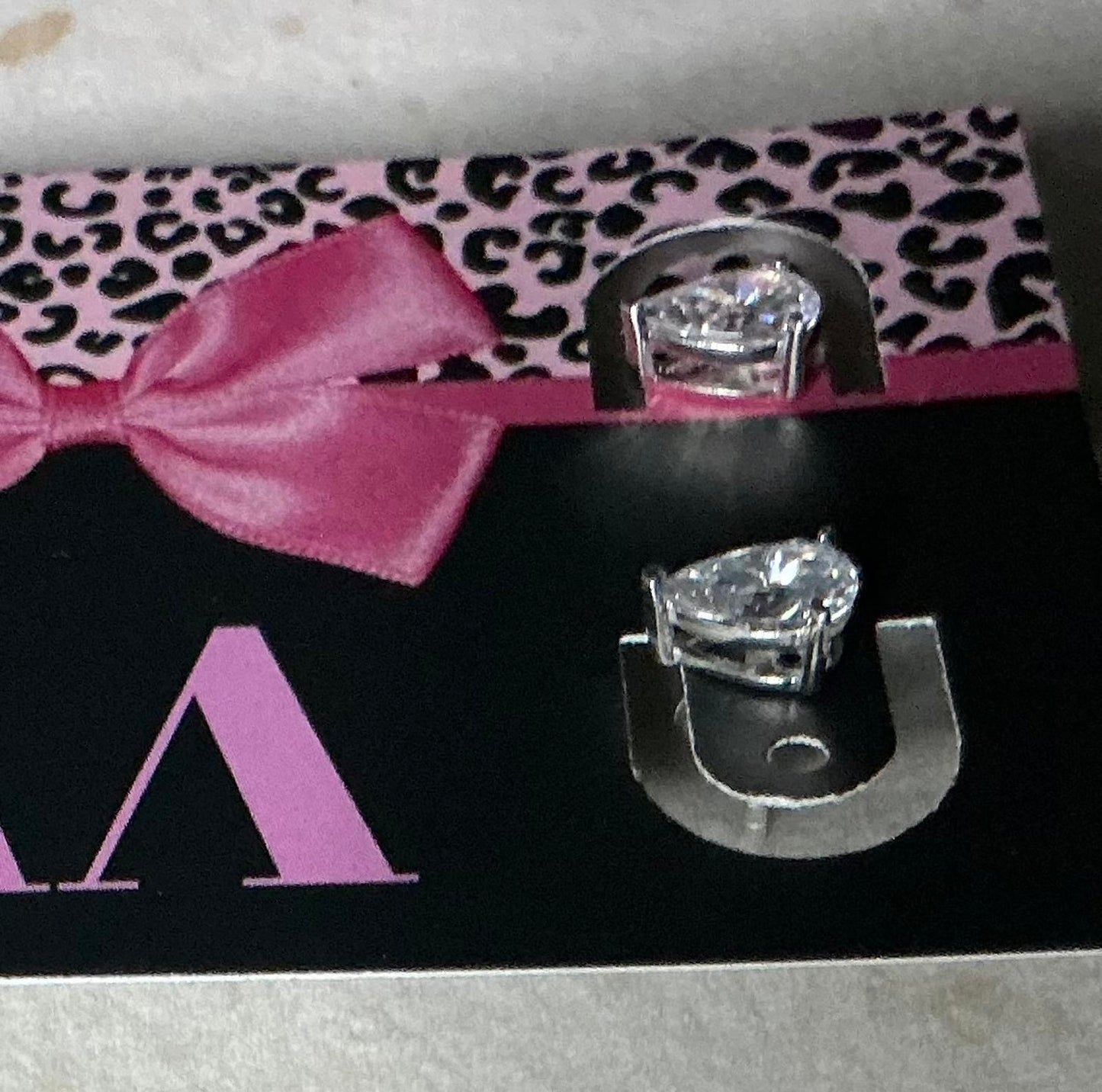 ^ Pear Cut Stud Earrings
