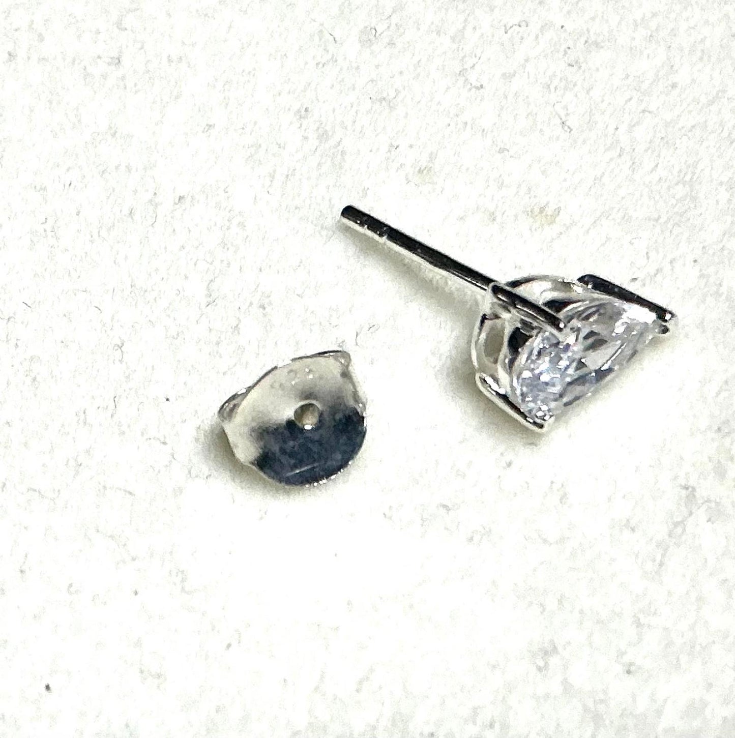 ^ Pear Cut Stud Earrings
