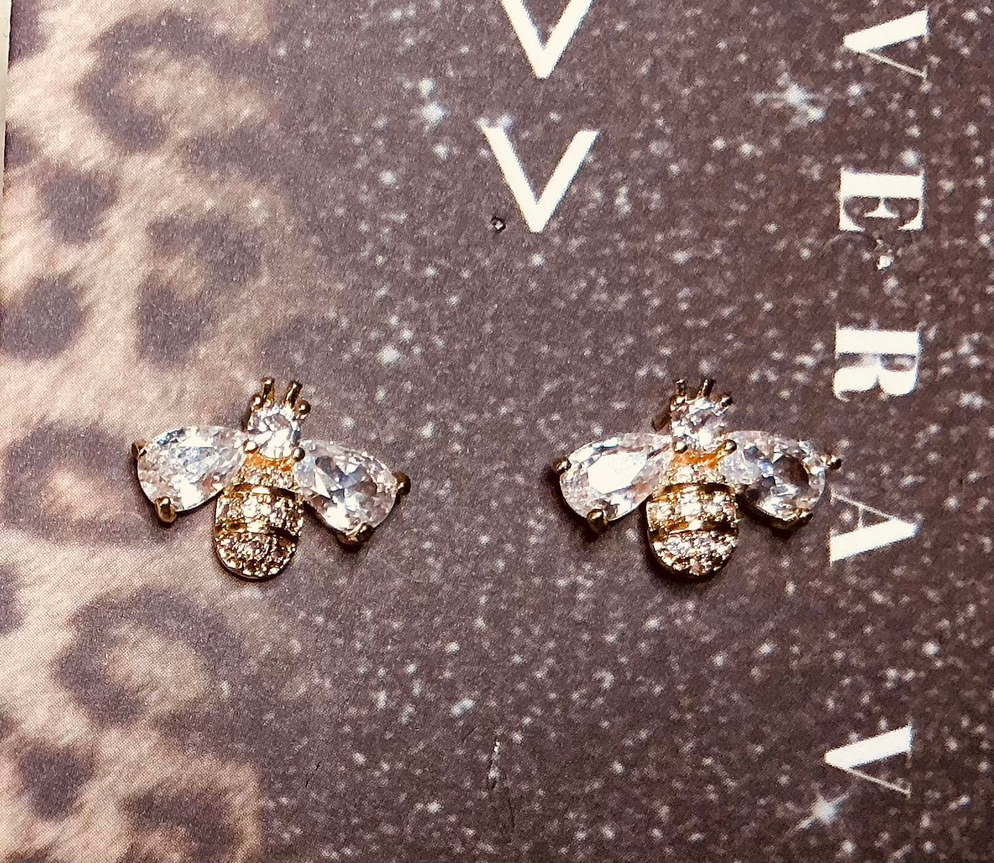^ Buzz By Earrings