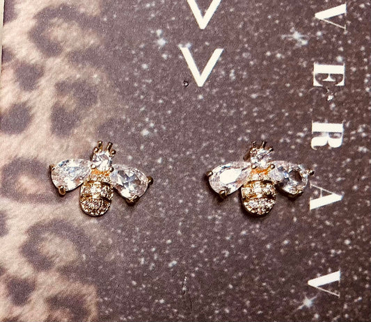 ^ Buzz By Earrings