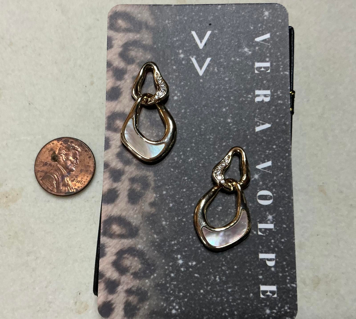 ^ Seashell Sapphire Earrings