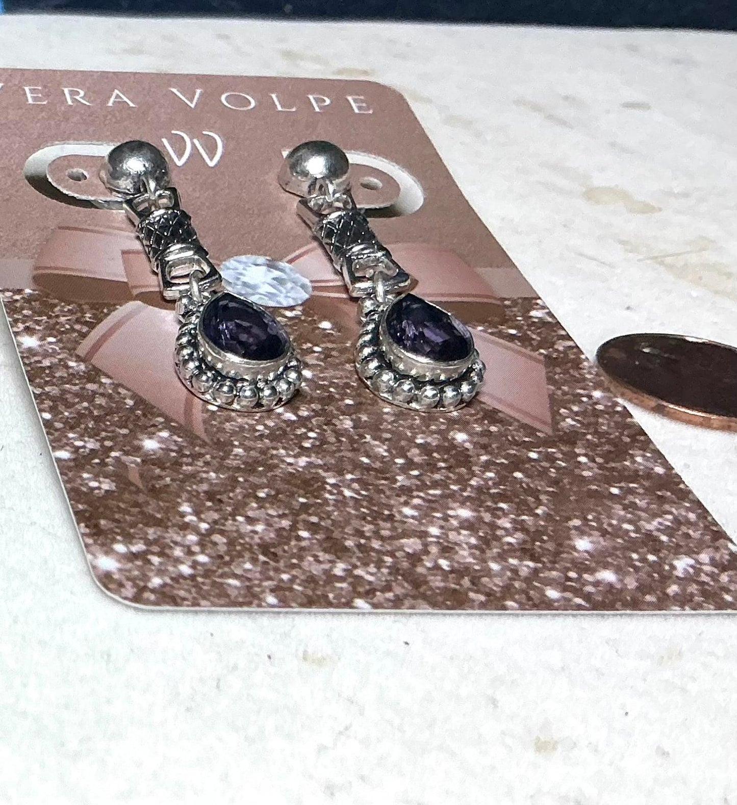 % Purple Teardrop Earrings filled