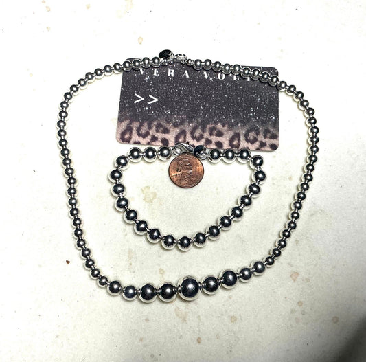 ^ Beaded Necklace and Bracelet Set